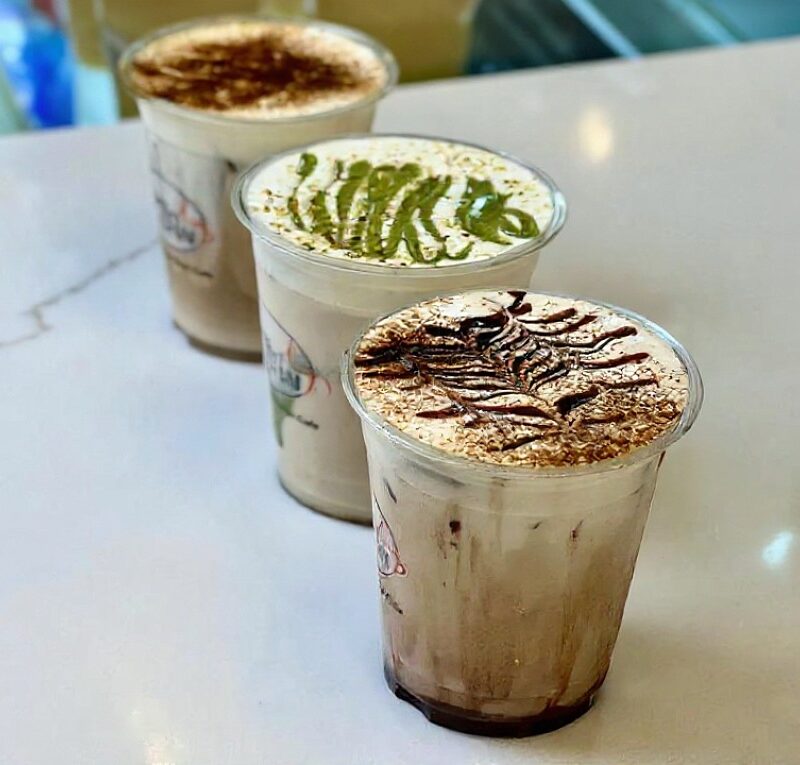 different cups of coffee on a table
